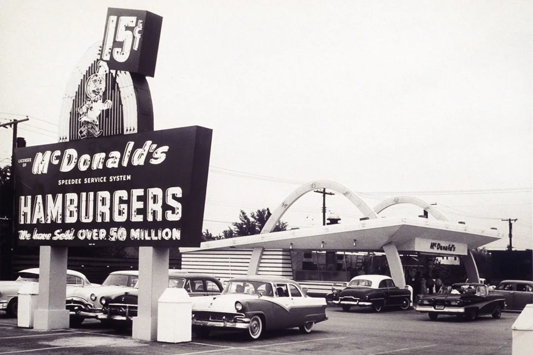 Vintage black and white photo of the original McDonald's location.
